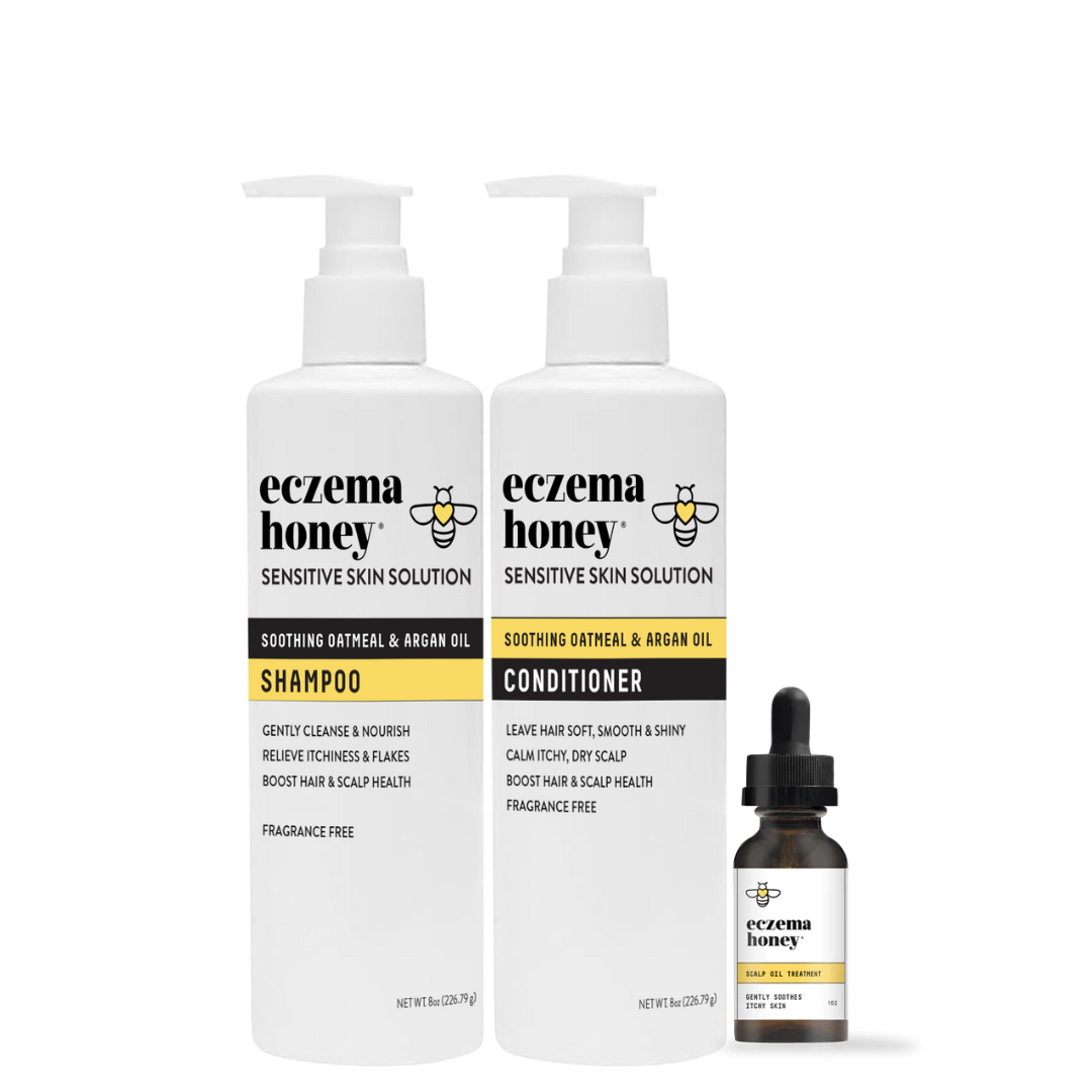 Eczema Honey sensitive skin solution shampoo, conditioner, and scalp oil bottles against a white background.